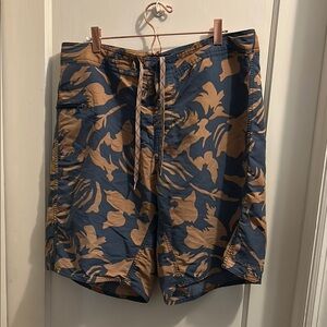 Patagonia floral board shorts. Button fly‎ with tie. Size 34